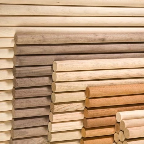 Stacks of wooden dowels